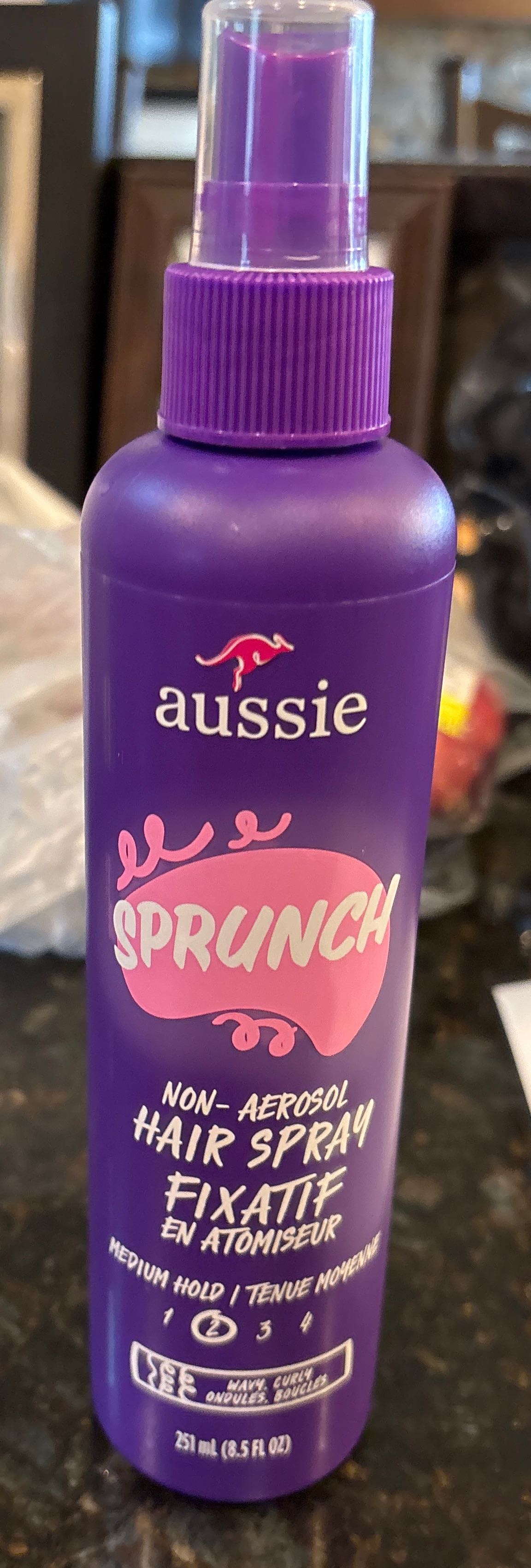 Scrunch hair spray fixatif