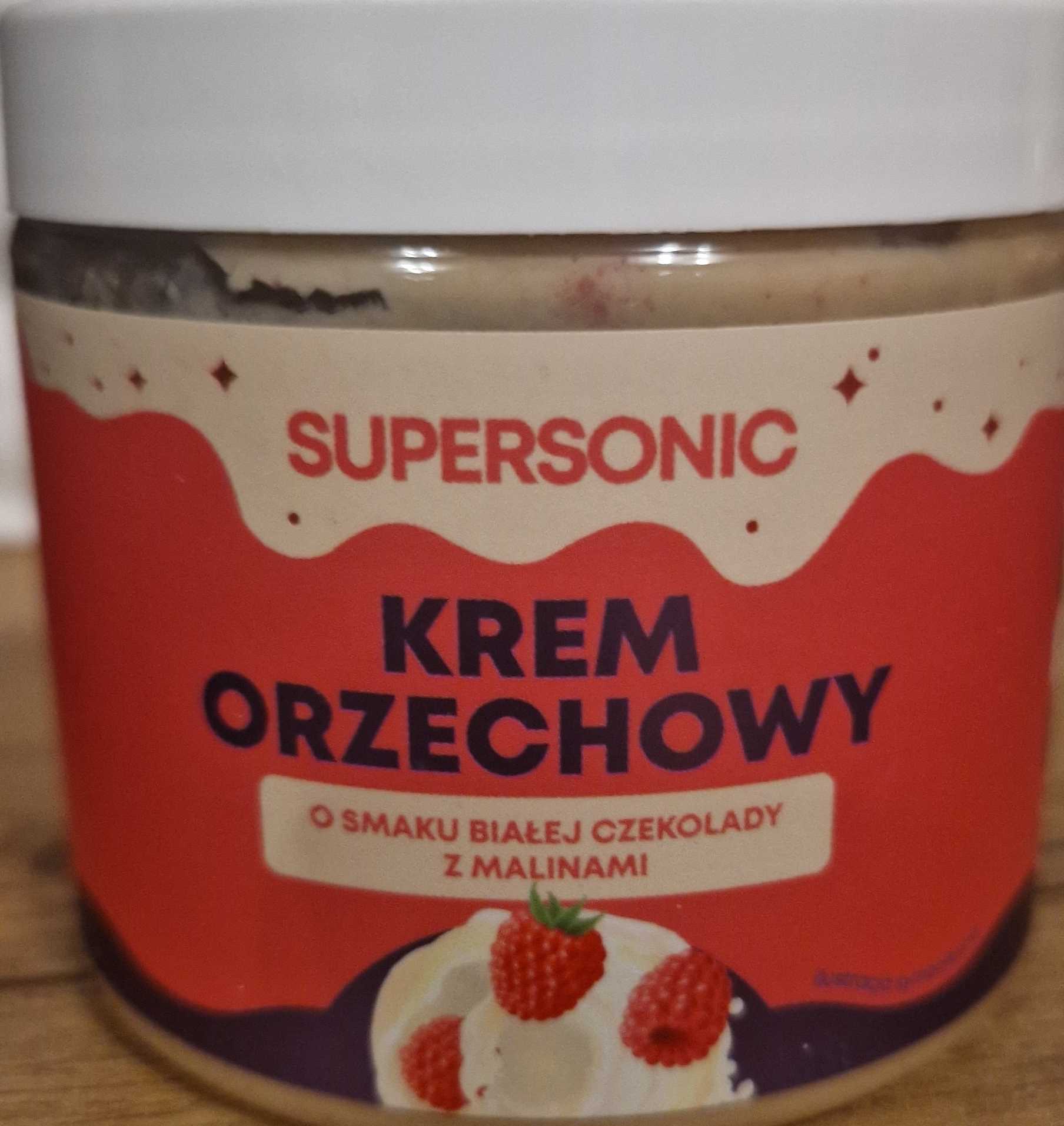 Krem orzechowy o smaku białej czekolady z malinami