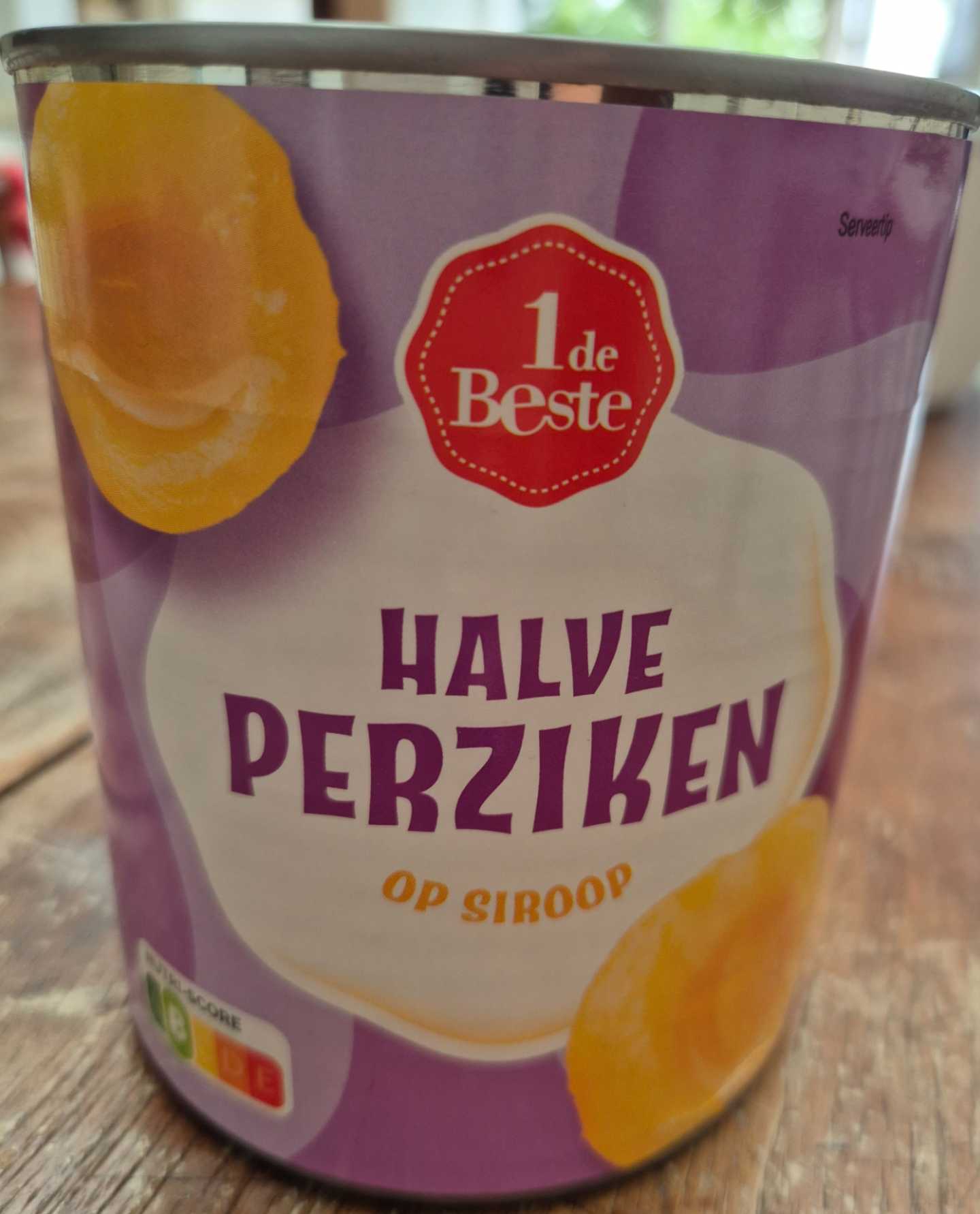 Halve perziken op siroop